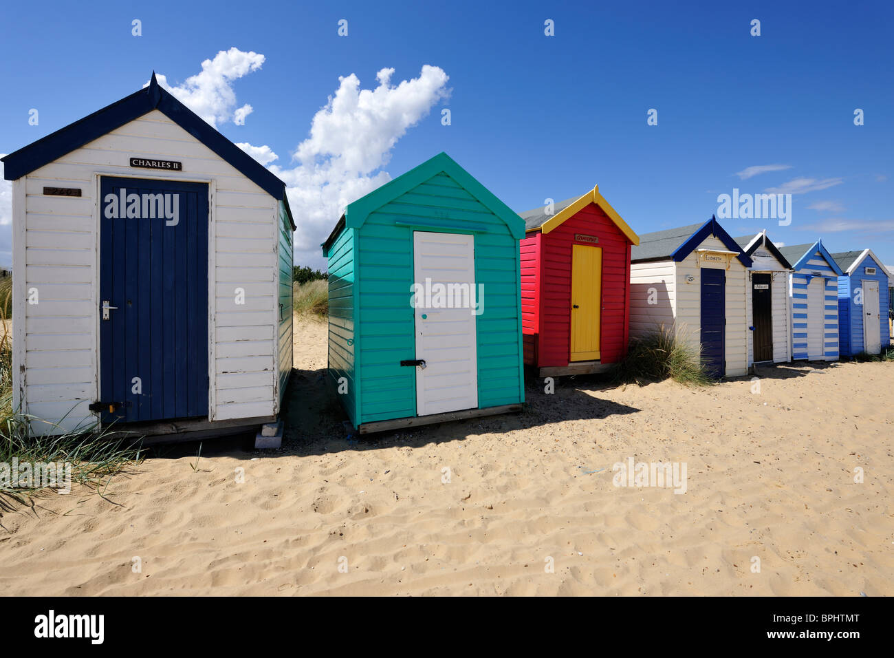 Colourful line of traditional wooden beach huts, Southwold, Suffolk, England Stock Photo