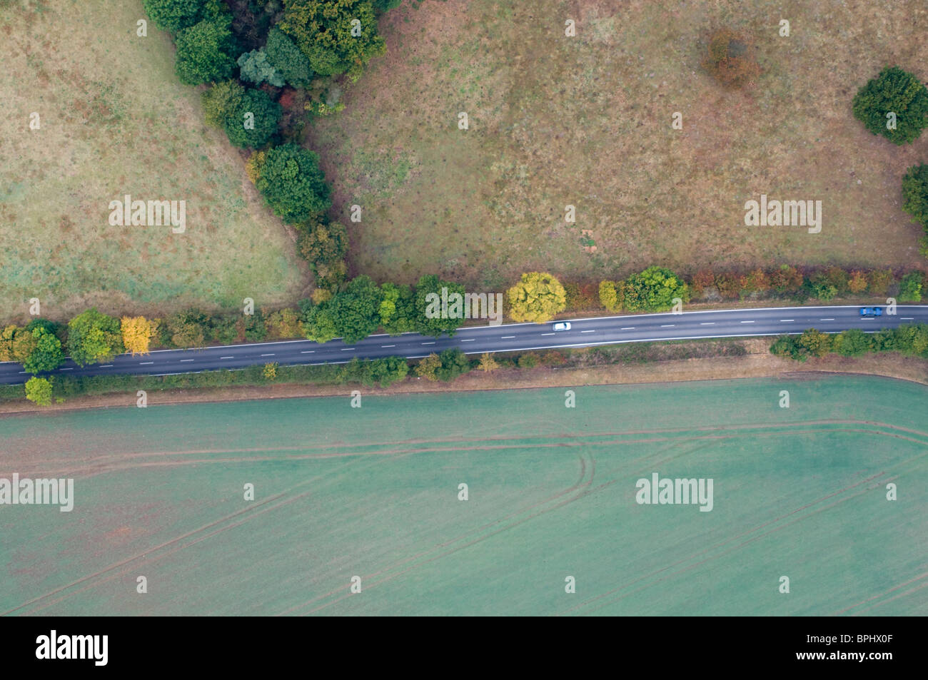 Aerial view of road cutting through countryside south of Norwich Norfolk Stock Photo