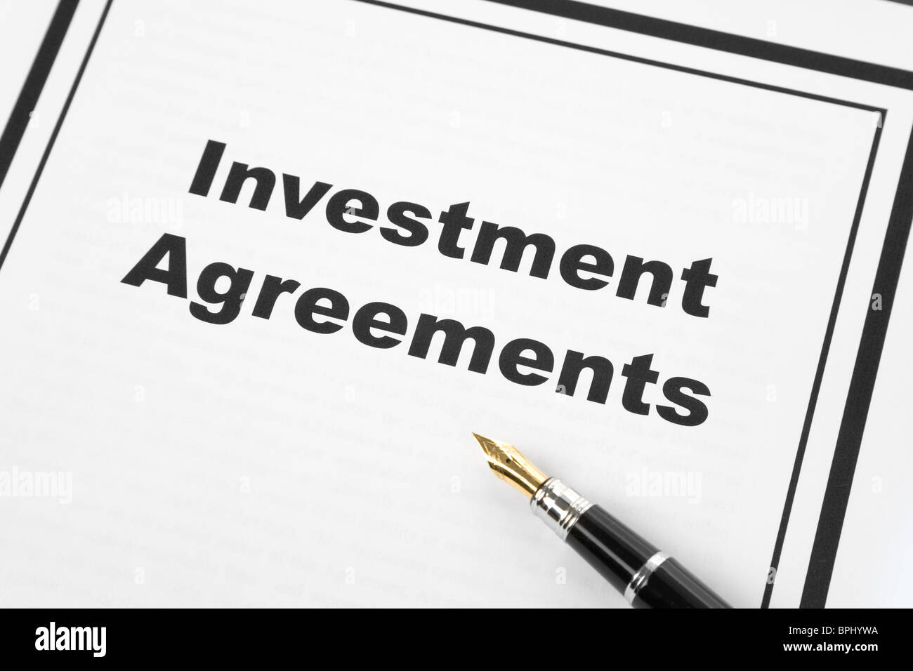 Investment Agreement and pen, business concept Stock Photo Alamy
