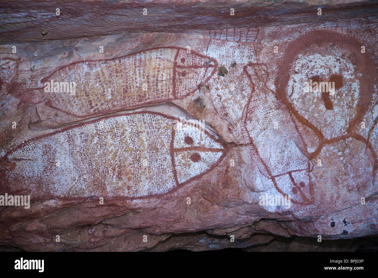 Wandjina figures are visually striking ancient Aboriginal art found in the Kimberley region Raft Point Australia Stock Photo