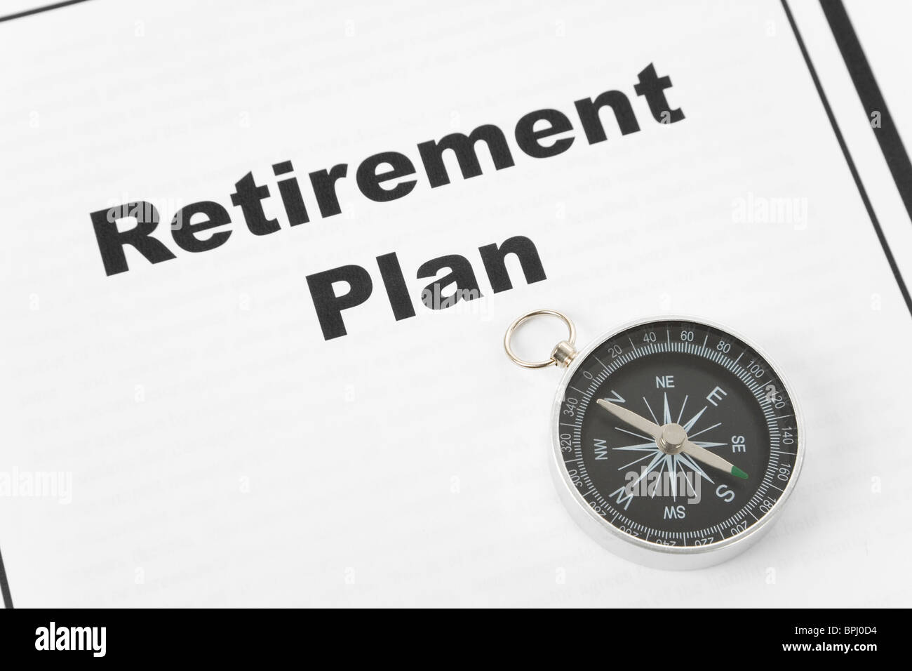 Retirement Plan and Compass, business concept Stock Photo Alamy