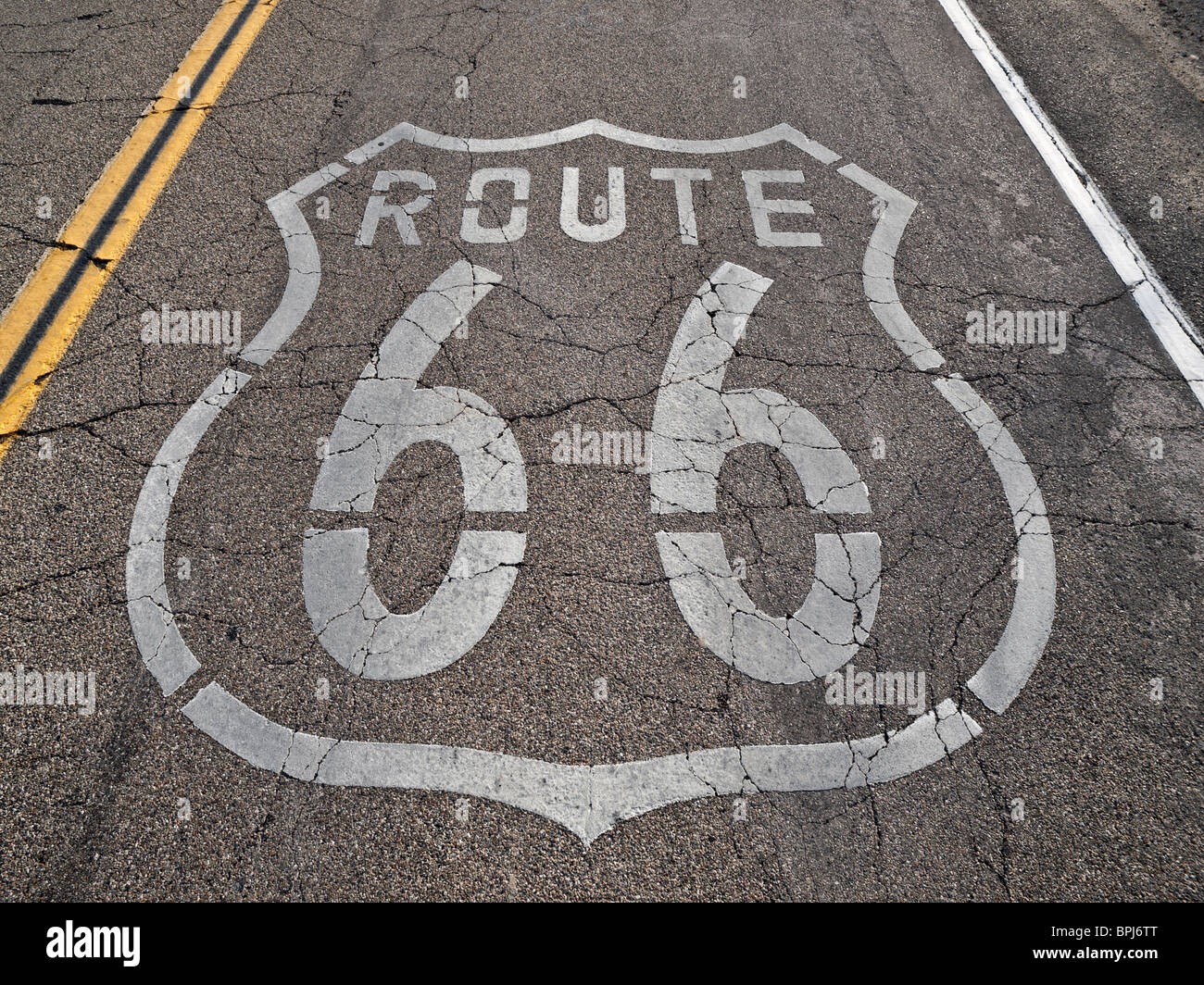 Old, broken section of historic Route 66 in California's Mojave desert. Stock Photo