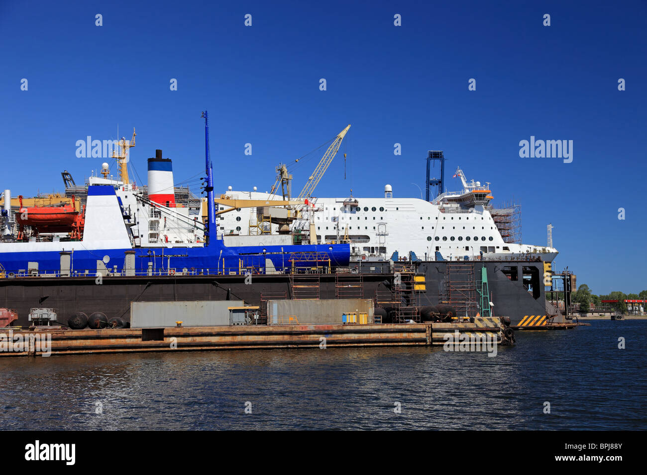 A large passenger ship is being renovated in shipyard Gdansk, Poland. Stock Photo