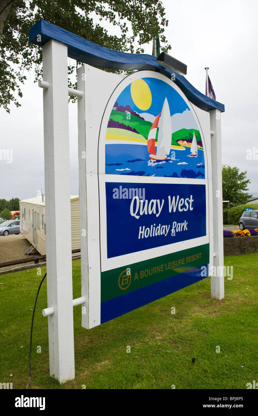 Sign outside Quay West holiday caravan park in the seaside town of New Quay Ceredigion West Wales UK Stock Photo