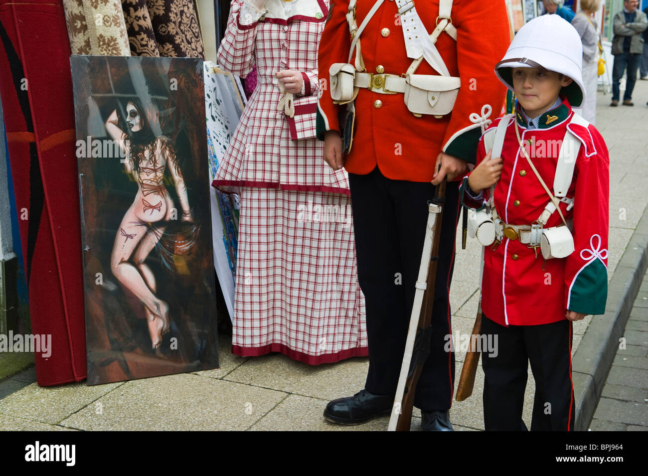 Man and boy in period military uniform with lady at the Victorian Festival in Llandrindod Wells Powys Mid Wales UK Stock Photo