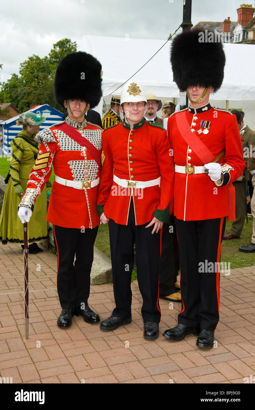 Men dressed in period military uniform at the Victorian Festival in Llandrindod Wells Powys Mid Wales UK Stock Photo