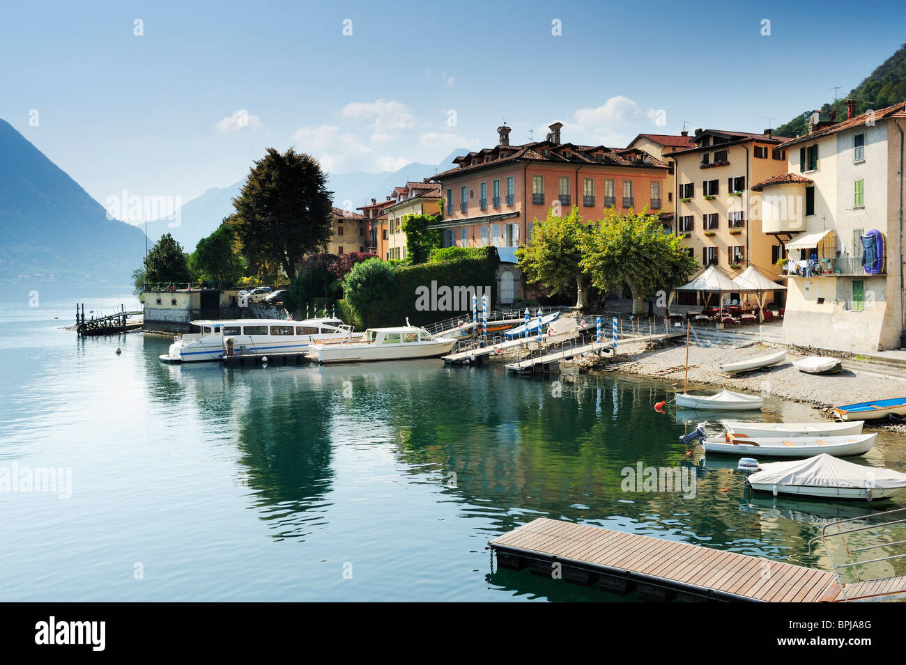 Boat harbor at western bank of Lake Como, Lombardy, Italy Stock Photo
