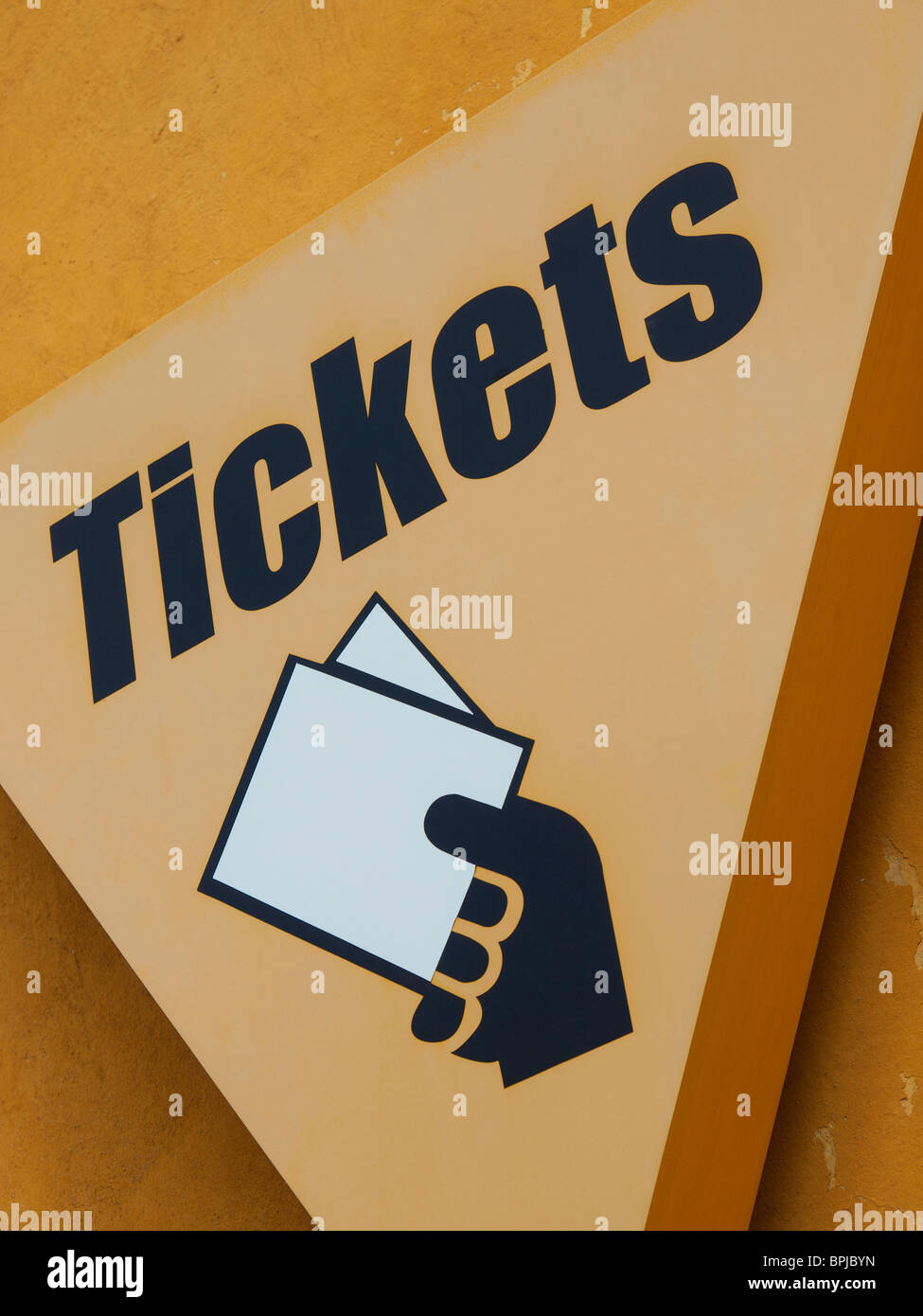 Yellow tickets sign with pictogram Stock Photo