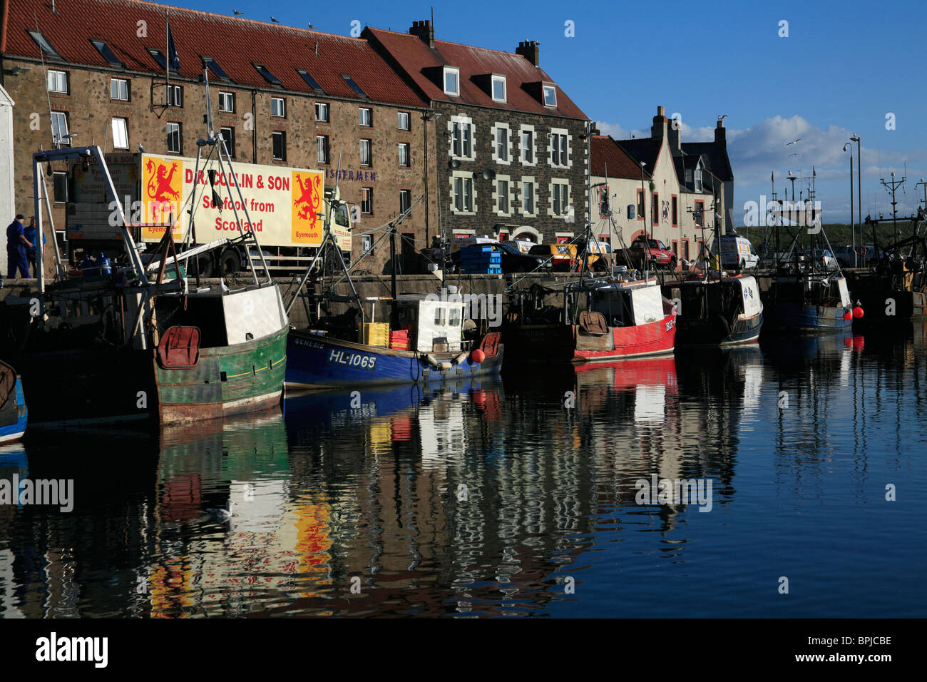 The harbour in the Scottish port of Eyemouth with the Fisherman's Mission building dominating the quayside Stock Photo