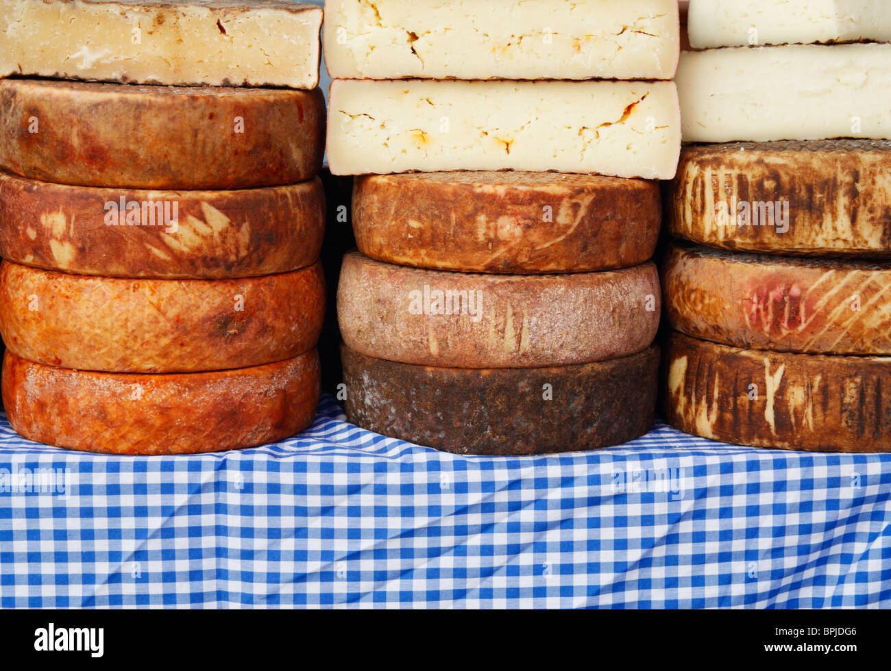 Cheeses on market stall in Teror on Gran Canaria Stock Photo