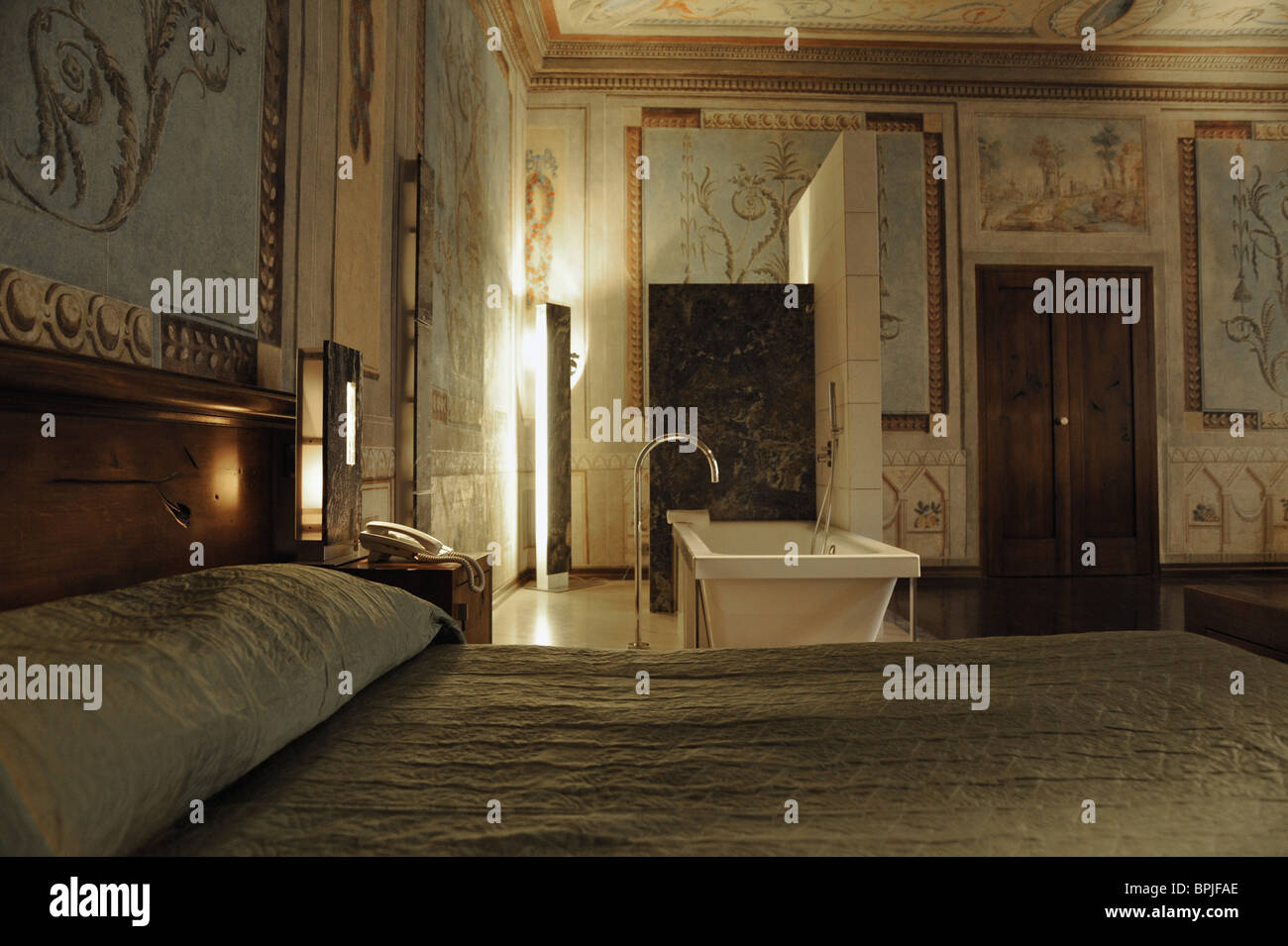 Bed And Bathtub At Luxury Suite At Hotel Stary Krakow