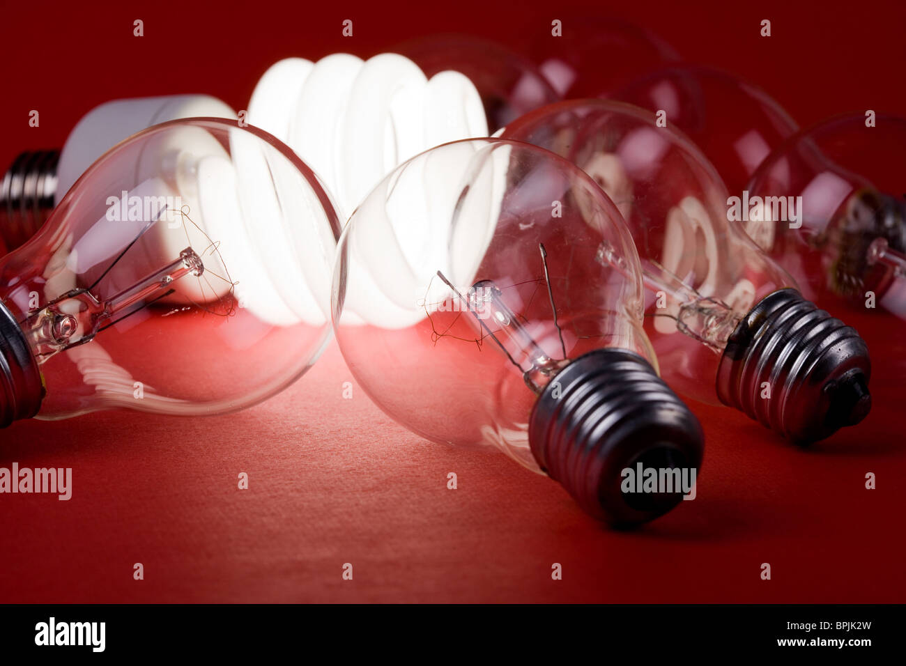 Compact Fluorescent Light bulb and tungsten Light bulb Stock Photo