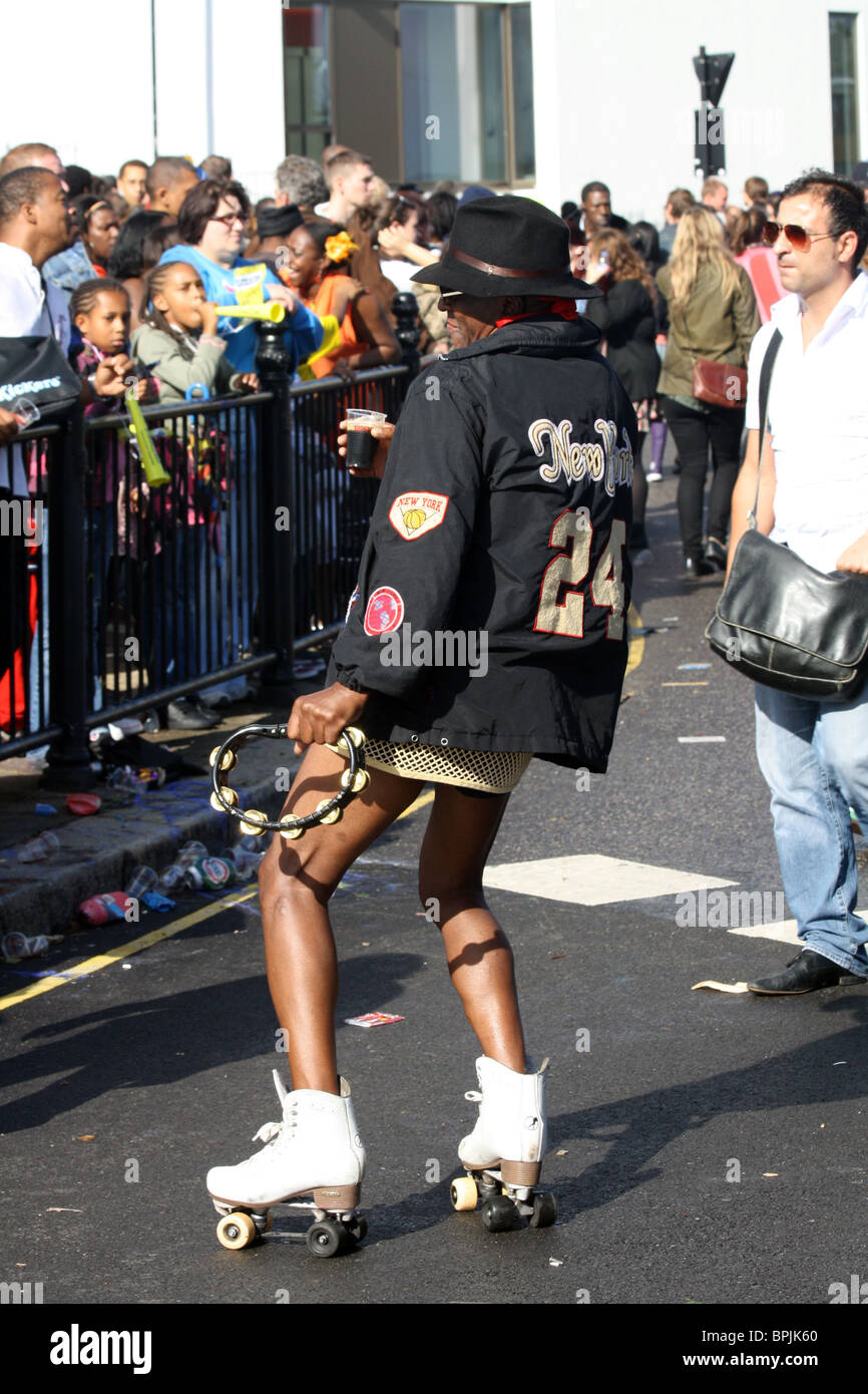 Old man performing in roller skates at the Notting Hill Carnival London