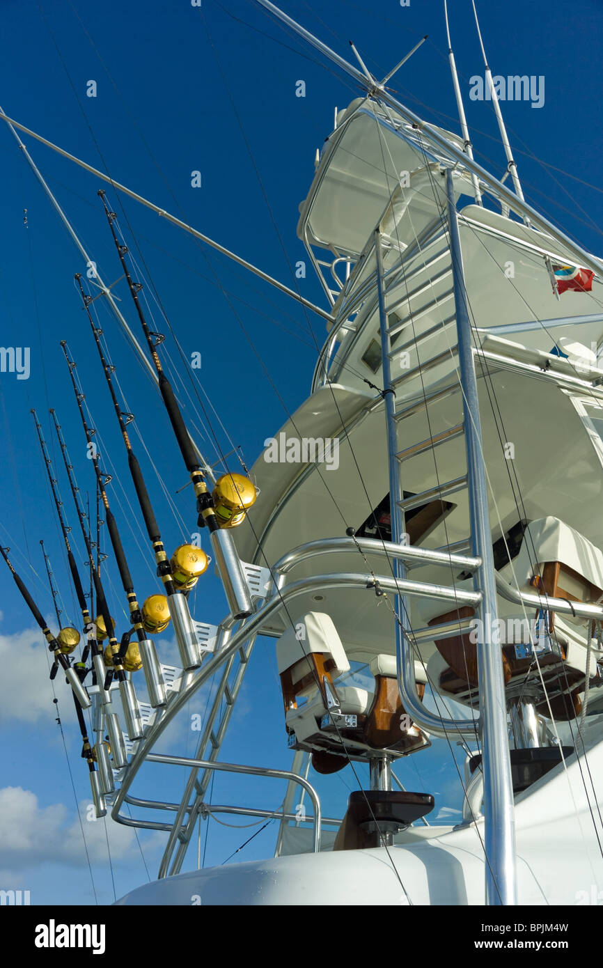 rods and reels on tower of boat Stock Photo