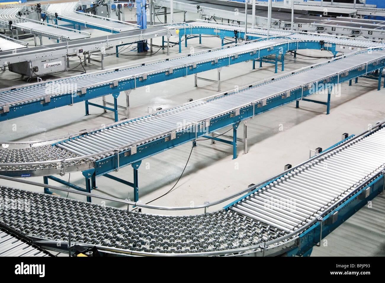 Rolling conveyor belt roller system for shipping in distribution