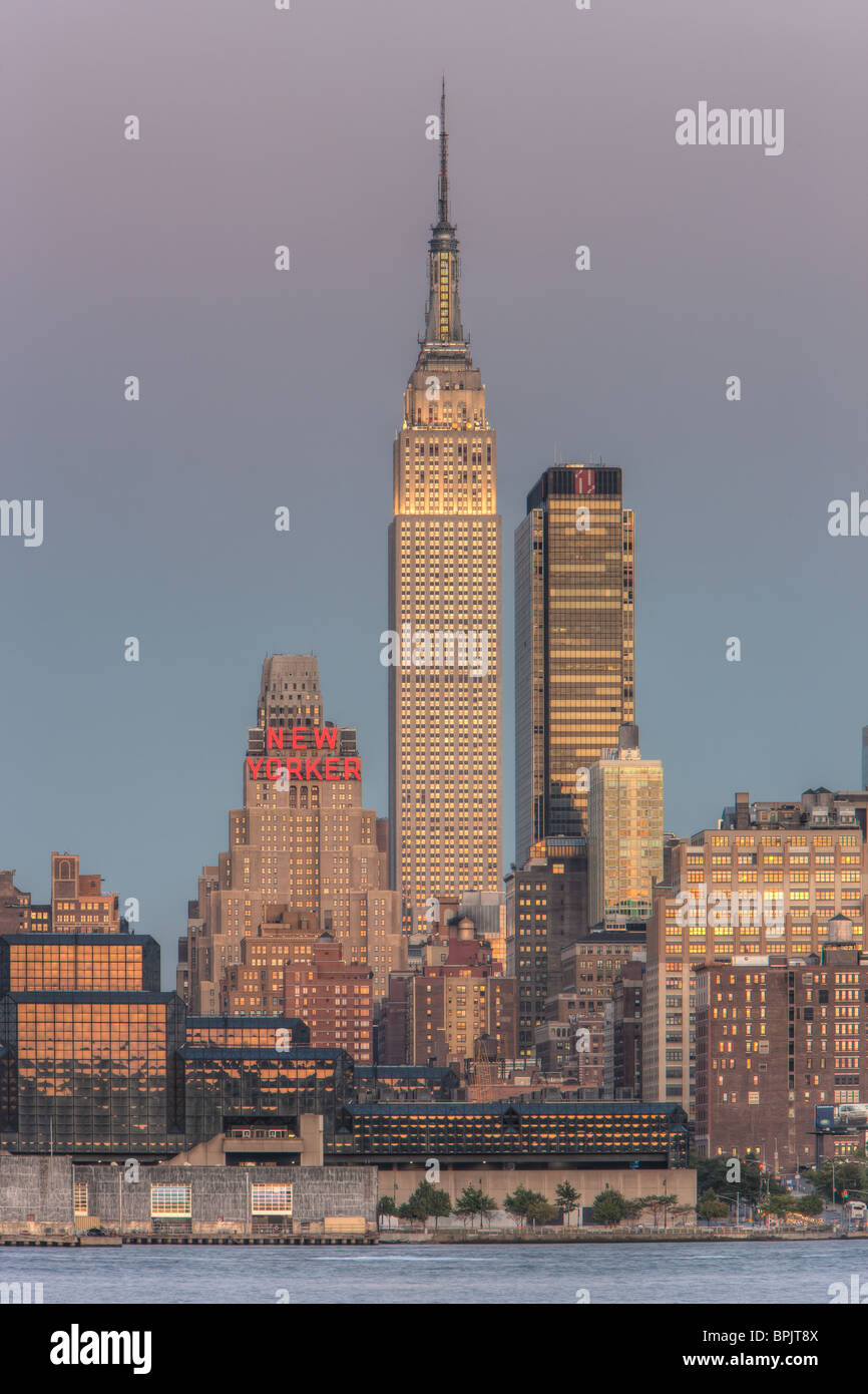 The Empire State Building and Manhattan skyline at twilight with the ...