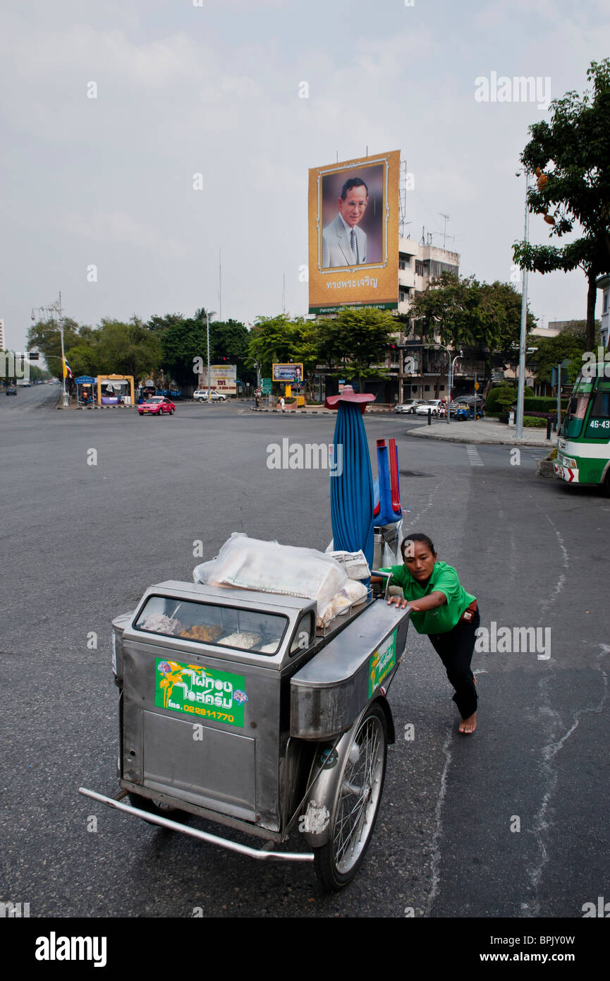 The main road in old Bangkok was flooded with images of the King of Thailand because of his birthday earlier on the 5th of Dec. Stock Photo
