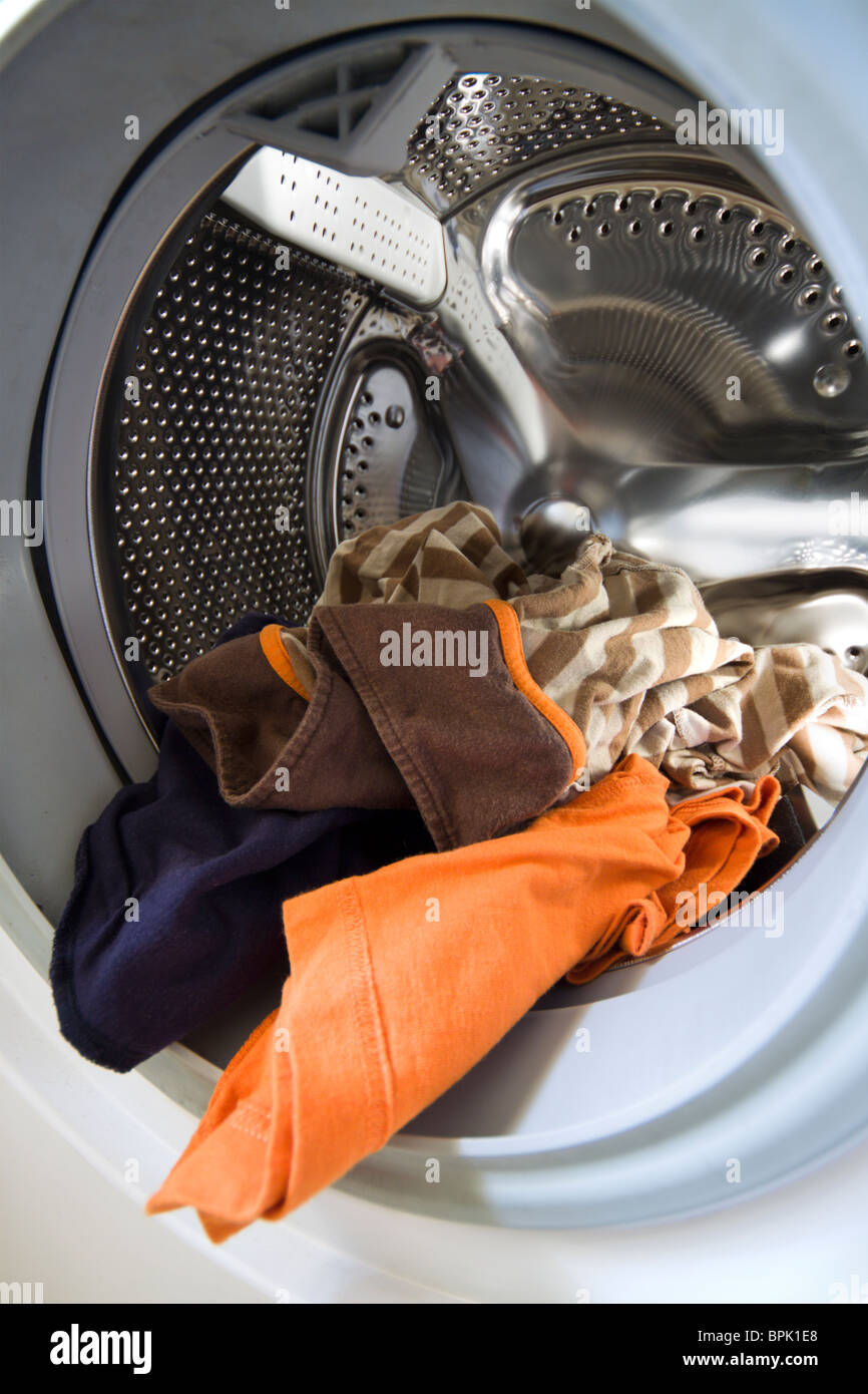 A washing machine with laundry Stock Photo Alamy