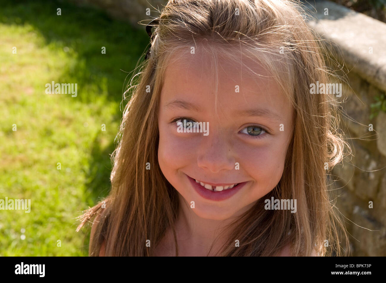 Portrait of a little girl with brown hair Stock Photo Alamy