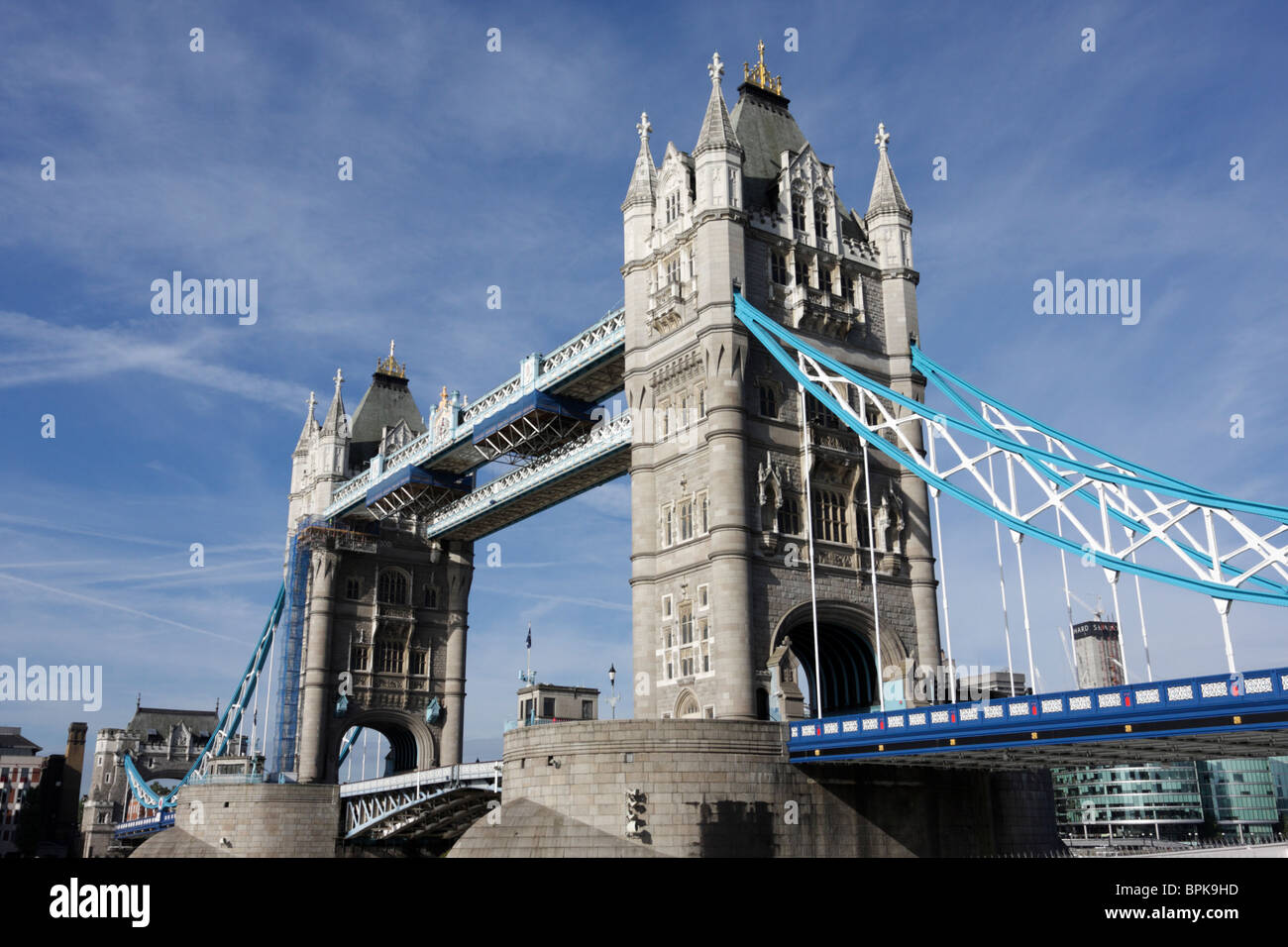 Low level angled aspect of the iconic Tower Bridge in London. One of the most photographed Victorian structures in the world. Stock Photo