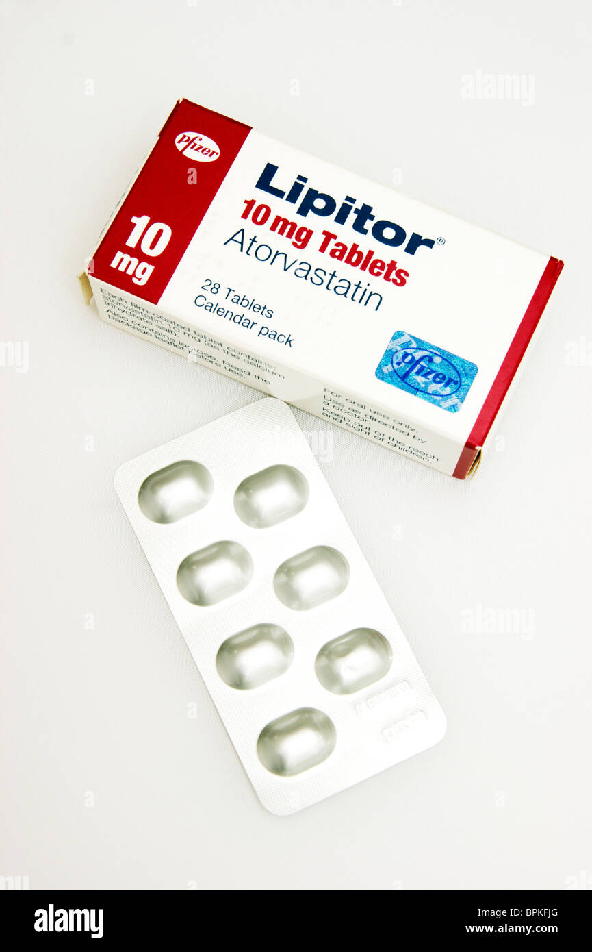 lipitor atorvastatin tablets (statins) reducing the amount of cholesterol & triglycerides the fatty substances in the blood Stock Photo