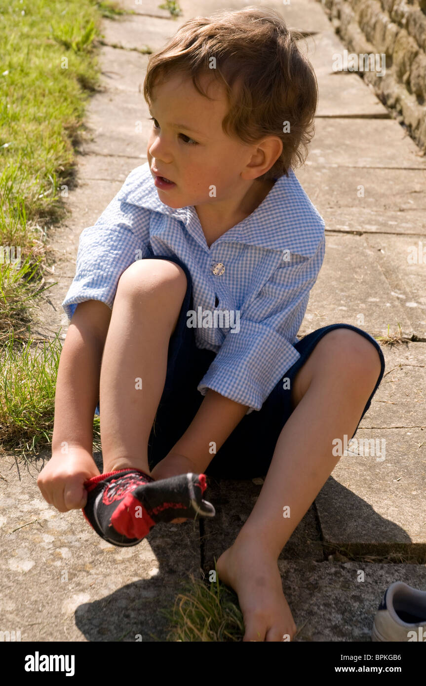 Putting On Socks Stock Photos & Putting On Socks Stock Images Page 2