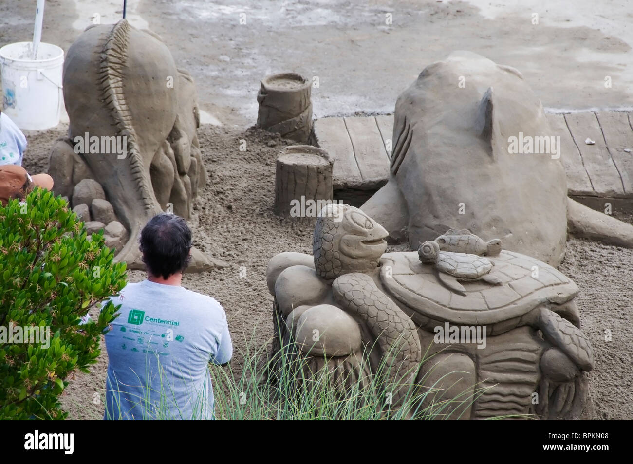 Back view of an elaborate sand sculpture at the Sand in the City event