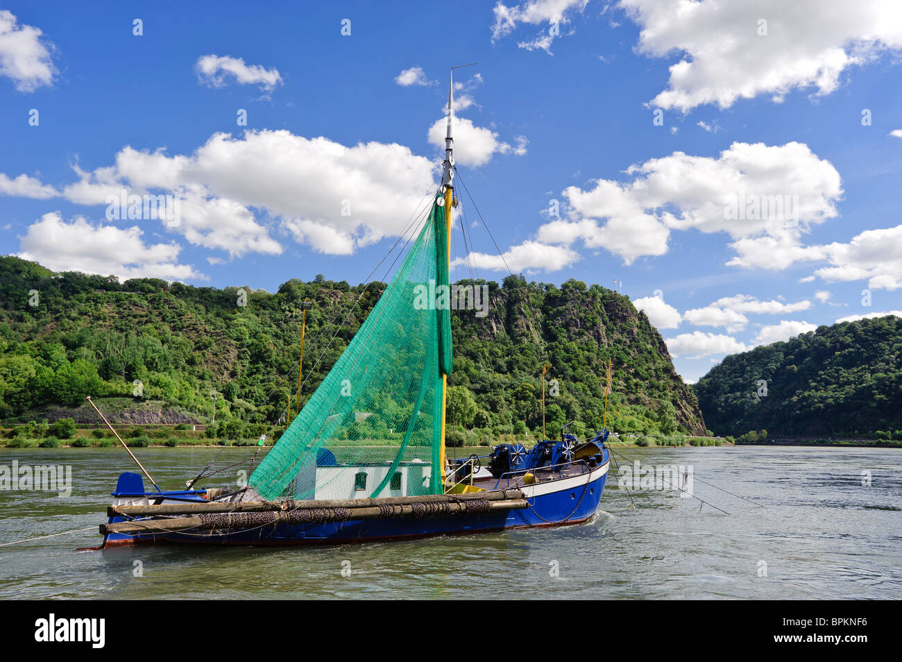 Old fishing boat on the Rhine River at the Lorelei Rock, UNESCO World Heritage Site, Sankt Goarshausen,  Germany Stock Photo