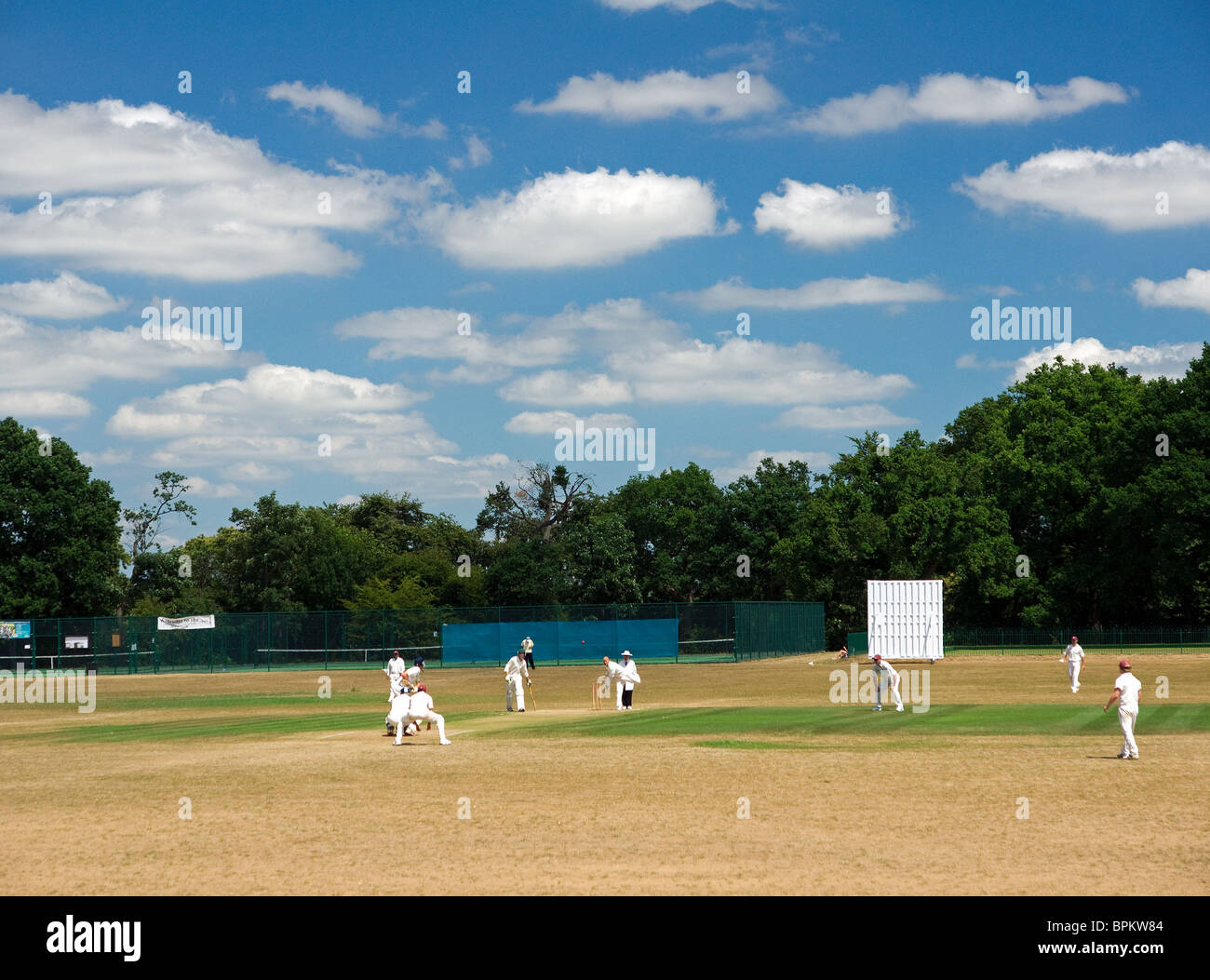 A cricket match at Busbridge Recreation Ground in Godalming in Surrey