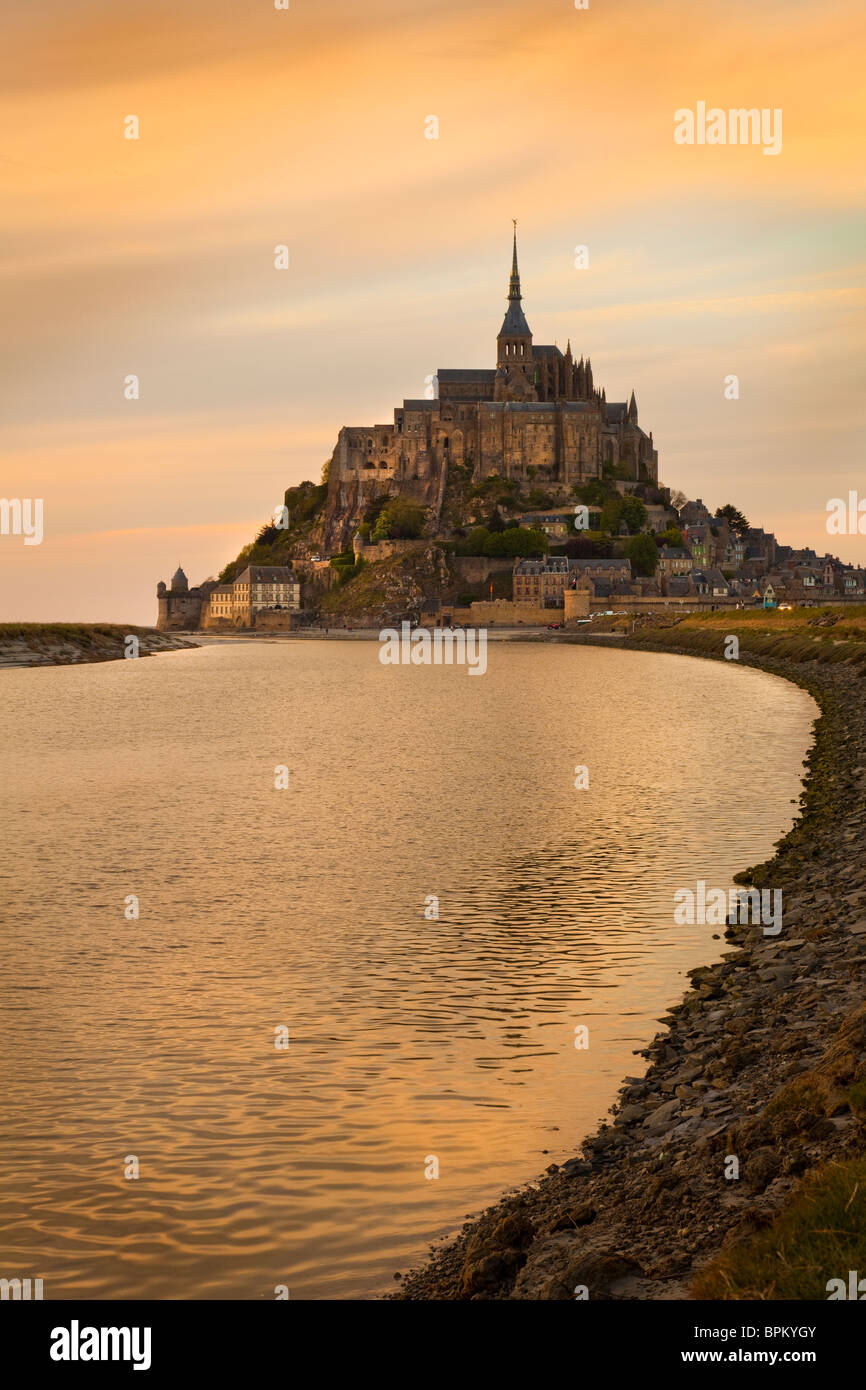 Evening light behind the Mont Saint-Michel Abbey, Normandy, France Stock Photo