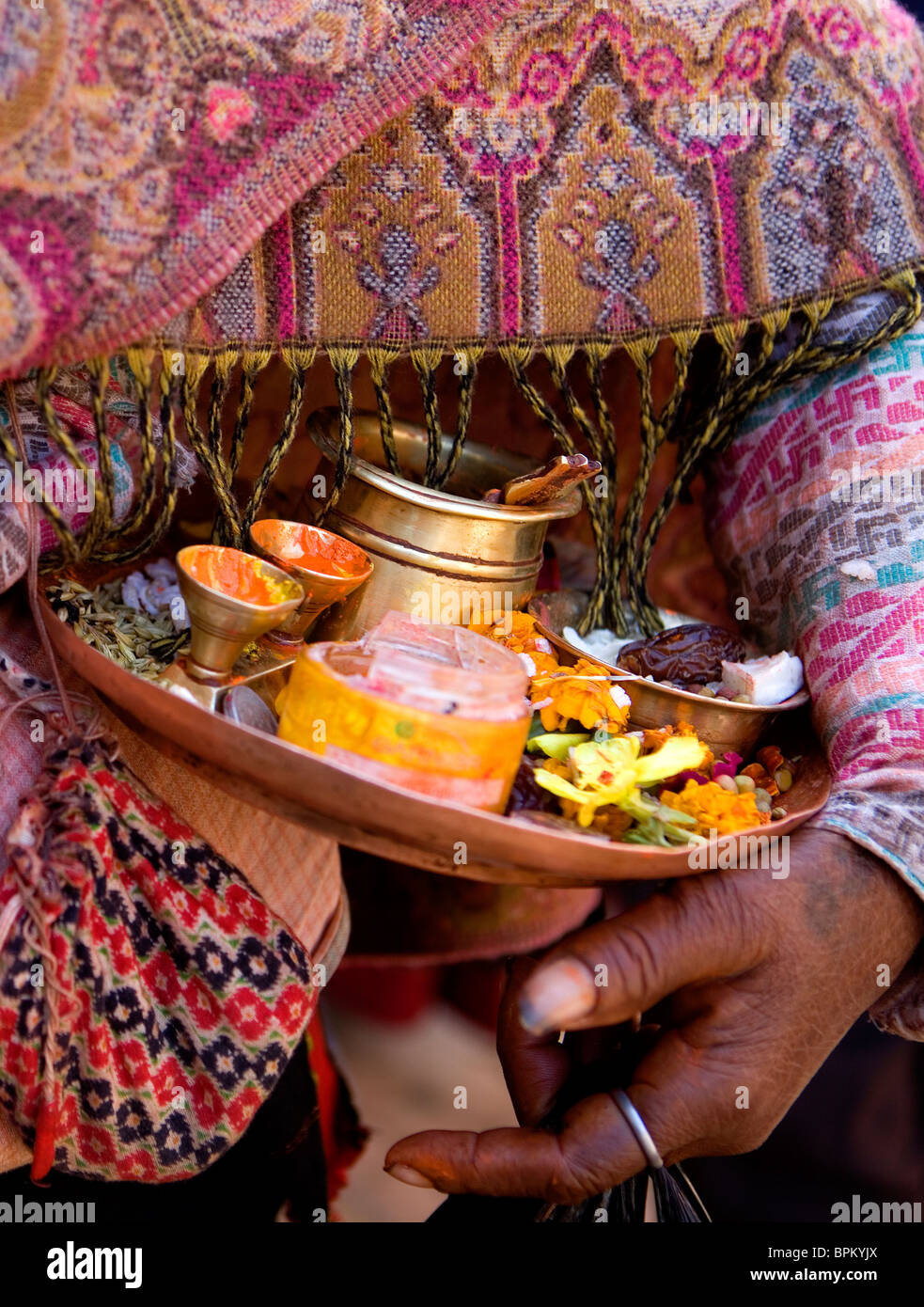 Woman offering sacrifice items Buddhist temple  Bhaktapur Nepal Asia Stock Photo