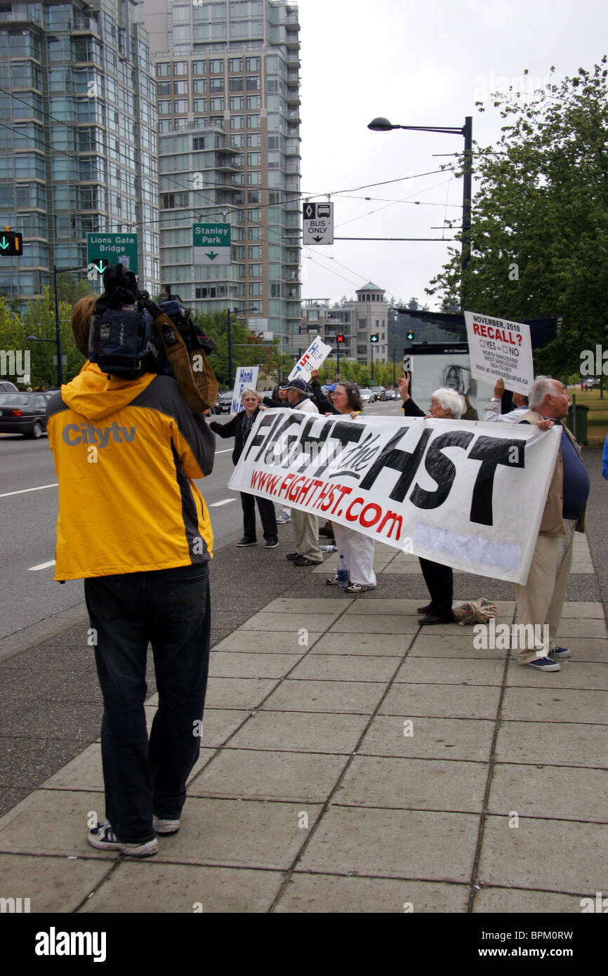 Citytv news cameraman films HST tax protestors in Vancouver, British Columbia, Canada Stock Photo
