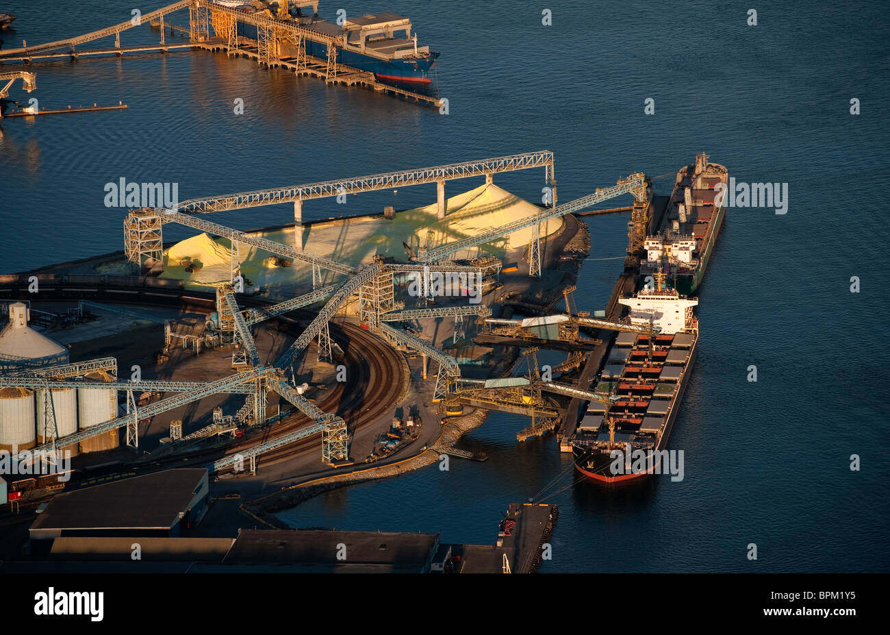 Sulfur Terminal,North Vancouver, Vancouver Harbour,cargo ship Hong Dai,British Columbia, Canada Aerial Stock Photo