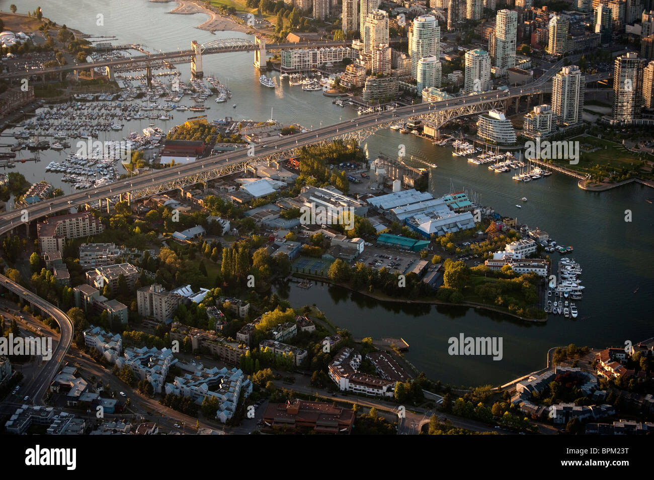 Granville Island on False Creek, Vancouver British Columbia aerial, Burrard Bridge Aerial Stock Photo