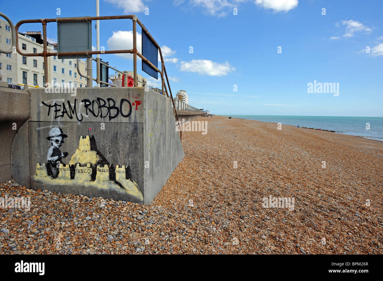 Latest work by Banksy which has appeared on St Leonard's seafront, it has already been defaced and now has a protective cover Stock Photo