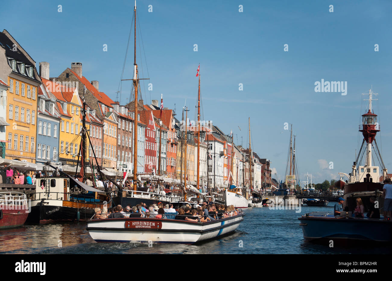 A view of the buildings and Nyhavn canal in Nyhavn Harbour, Copenhagen, Denmark. Stock Photo
