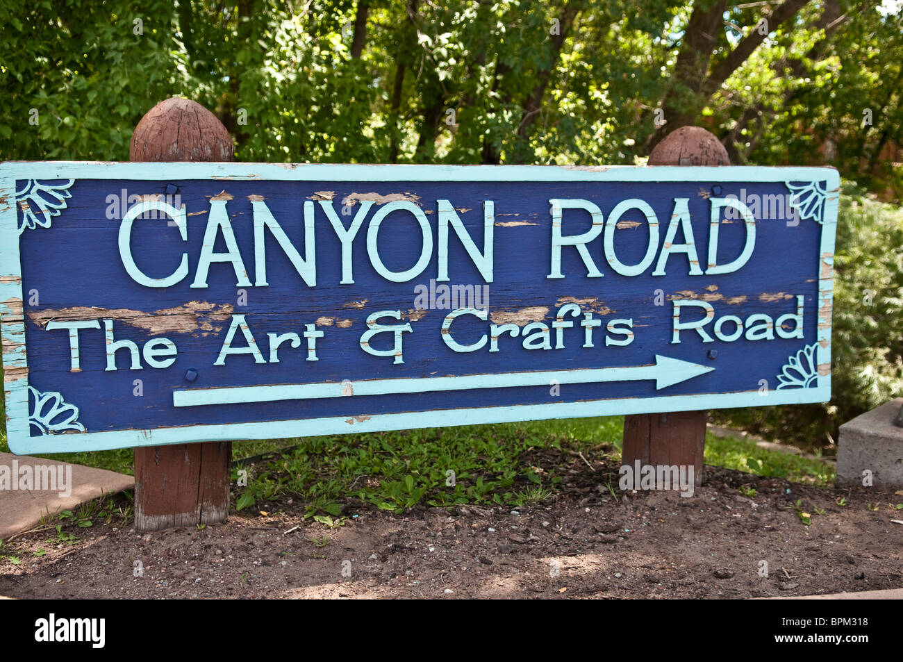 wooden canyon road sign for art and craft stores Santa Fe New Mexico