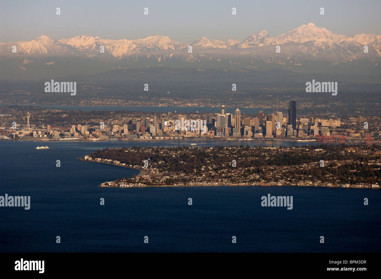 West Seattle, Seattle and Cascade Mountains, Washington,Lake Washington, Bellevue, Kirkland, Aerial Stock Photo