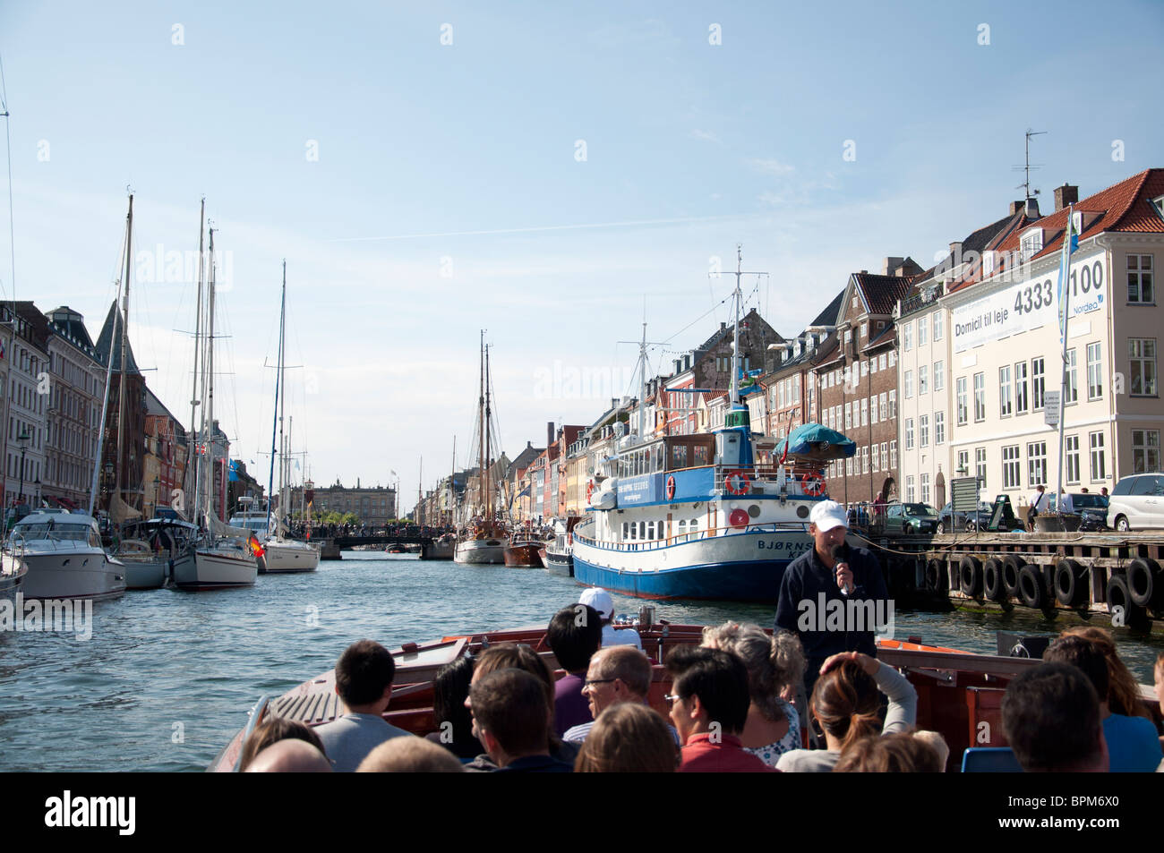 A view of the buildings and Nyhavn canal in Nyhavn Harbour, Copenhagen, Denmark. Stock Photo