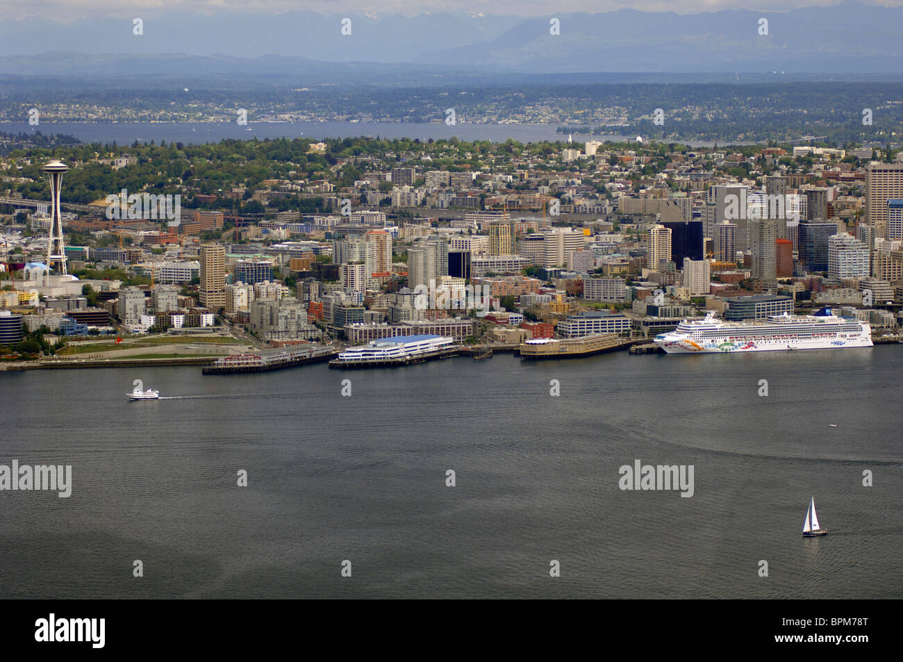 Seattle Skyline and Waterfront with cruise ship Norwegian Pearl with Space Needle and Dowtown Stock Photo