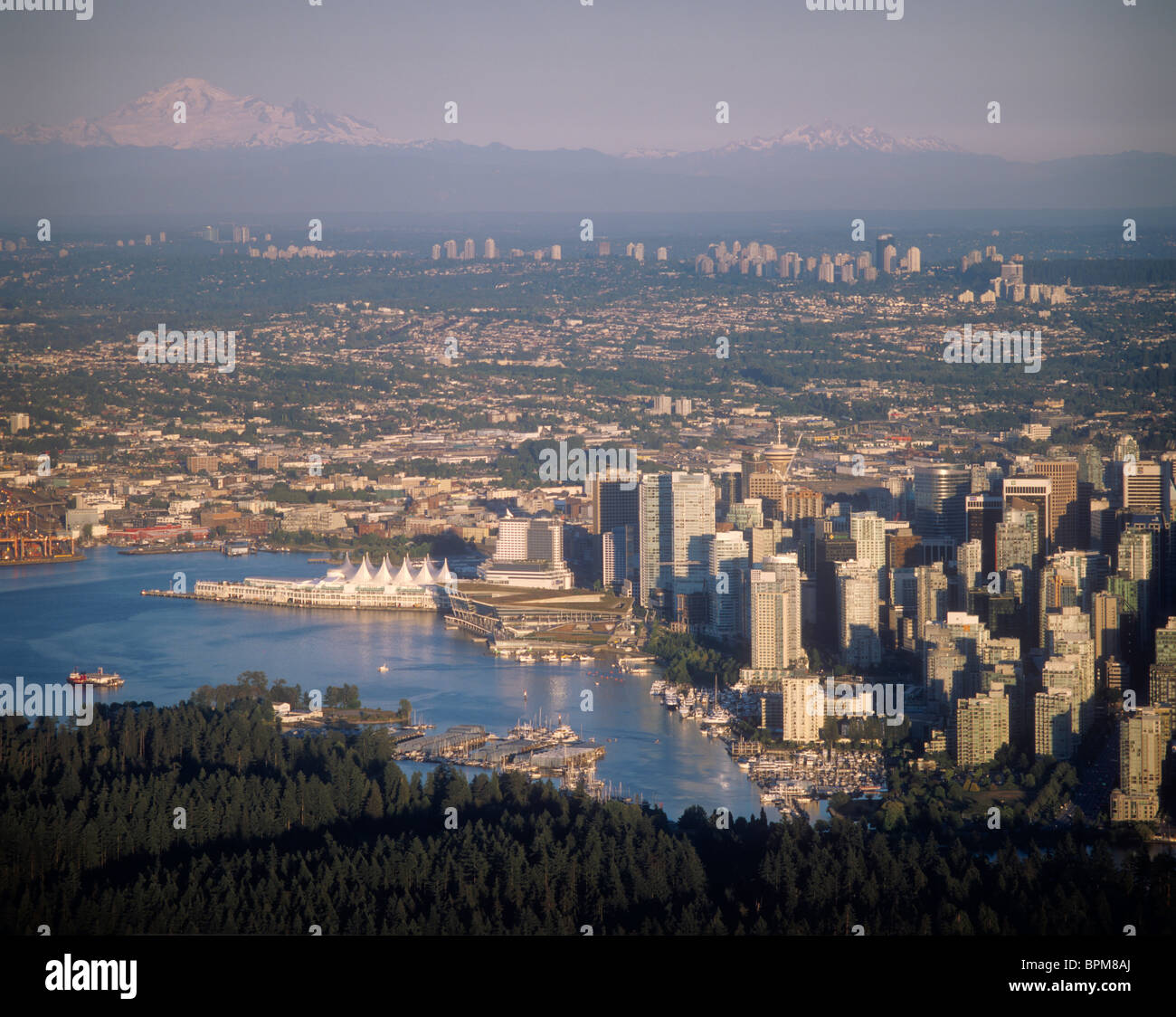 Stanley Park,Vancouver, Yacht Club, Coal Harbor and Canada Place, British Columbia Aerial Stock Photo