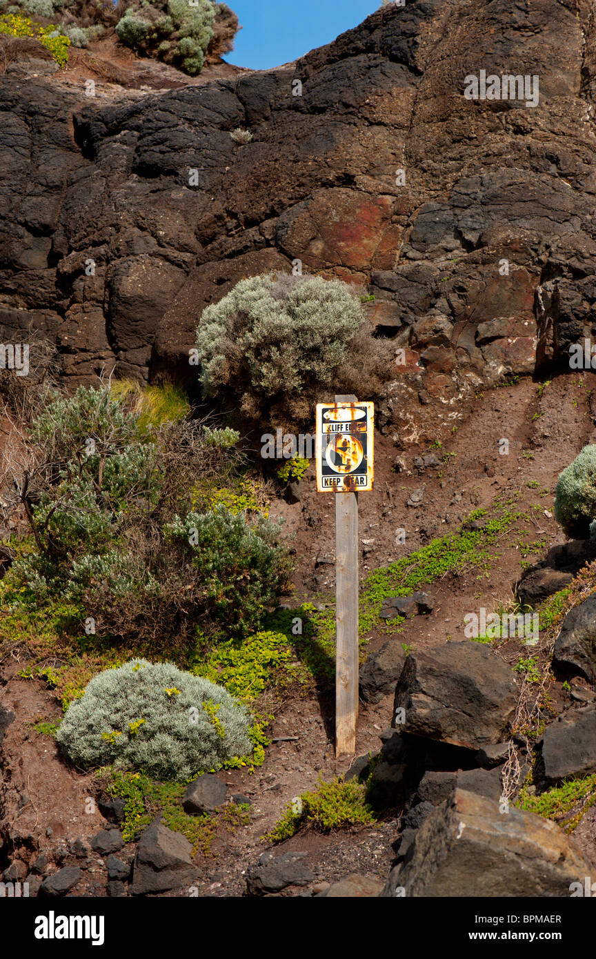 Signs warning of steep cliff edges at Cape schanck Victoria Australia. Stock Photo