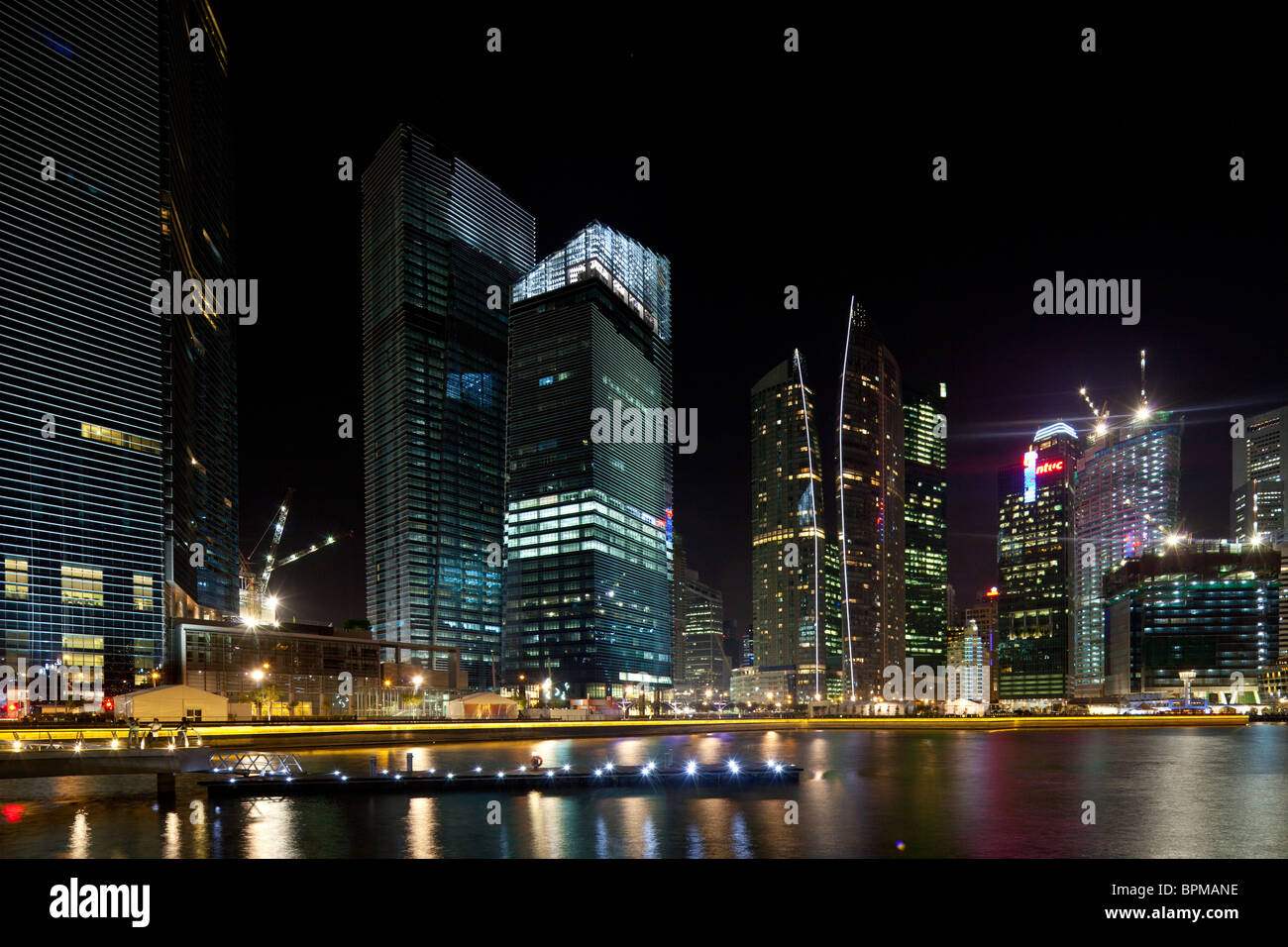 view of buildings around Marina Bay Singapore, at night Stock Photo