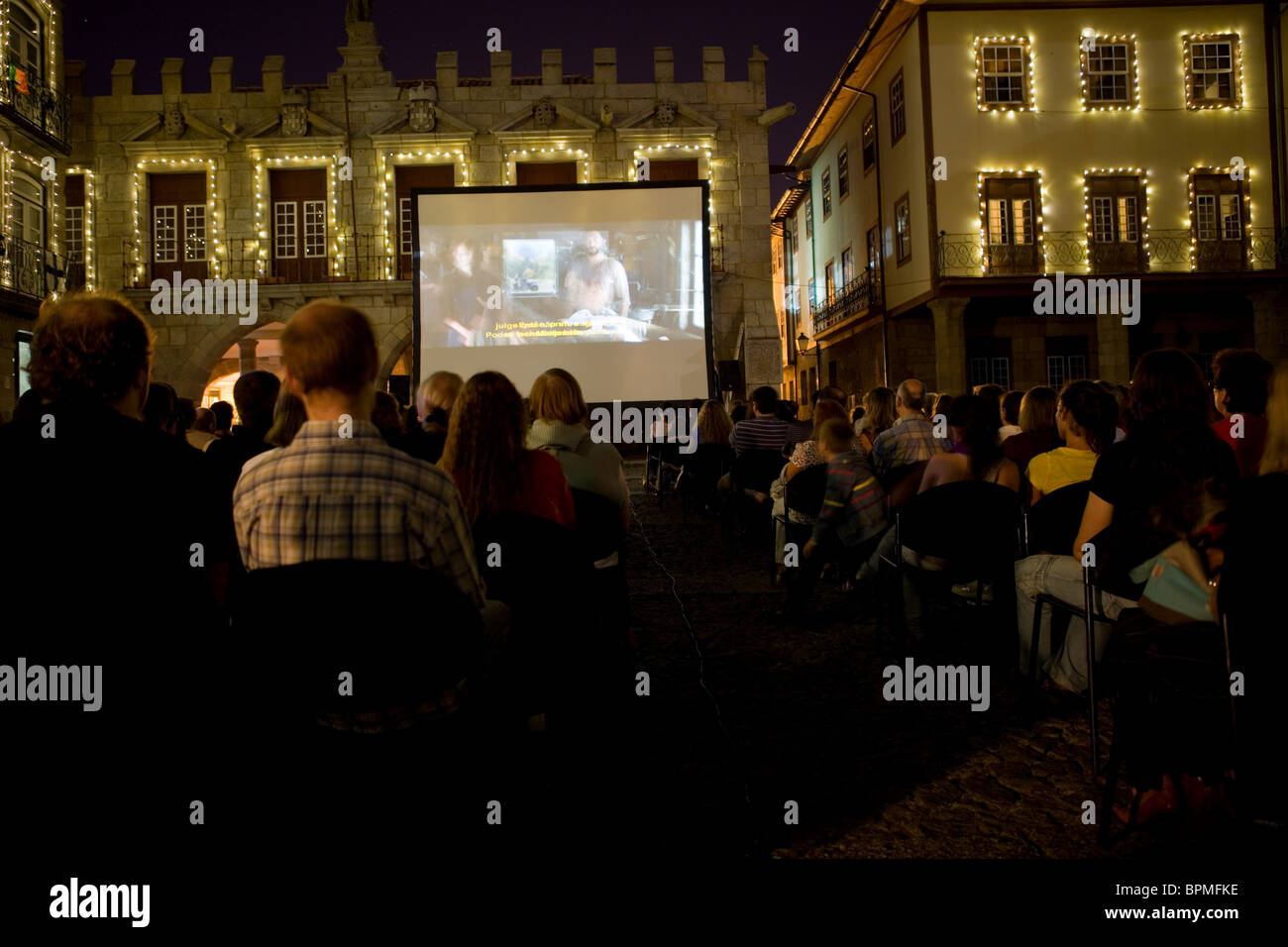 Cinema festival at night, main center of Guimaraes on Oliveira Square  in Guimaraes, Portugal Stock Photo