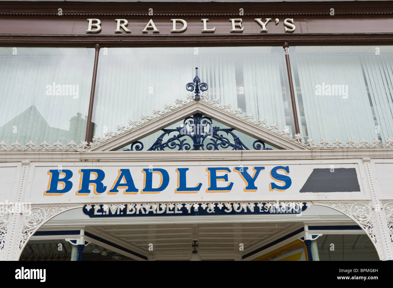 Victorian shop front with ornate canopy of Bradleys traditional ironmongers in Llandrindod Wells Powys Mid Wales UK Stock Photo
