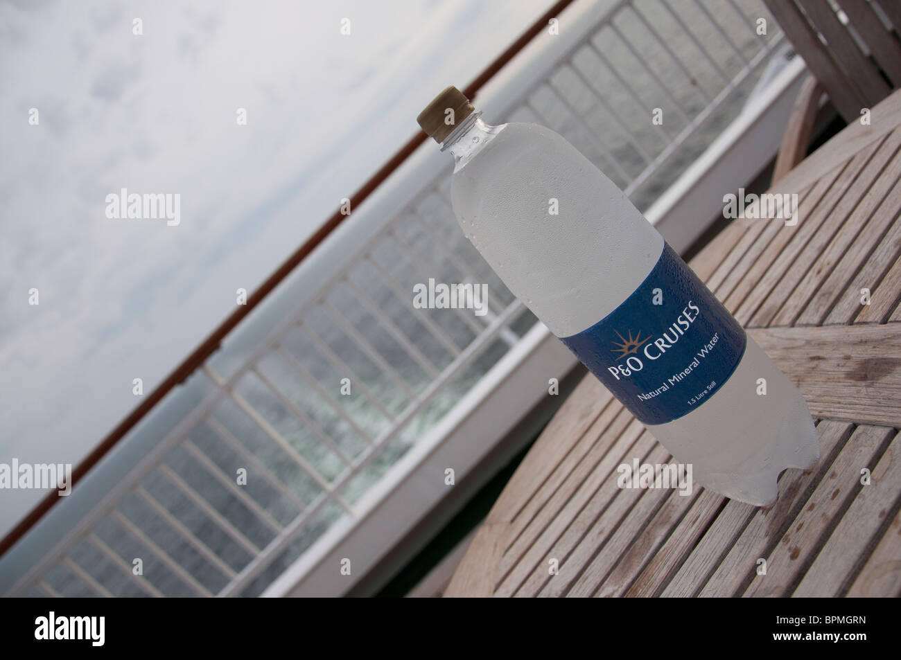A close up photograph of a P&O Cruises still mineral water bottle label on  a table at the stern of the P&O Cruise ship 'Aurora' Stock Photo - Alamy