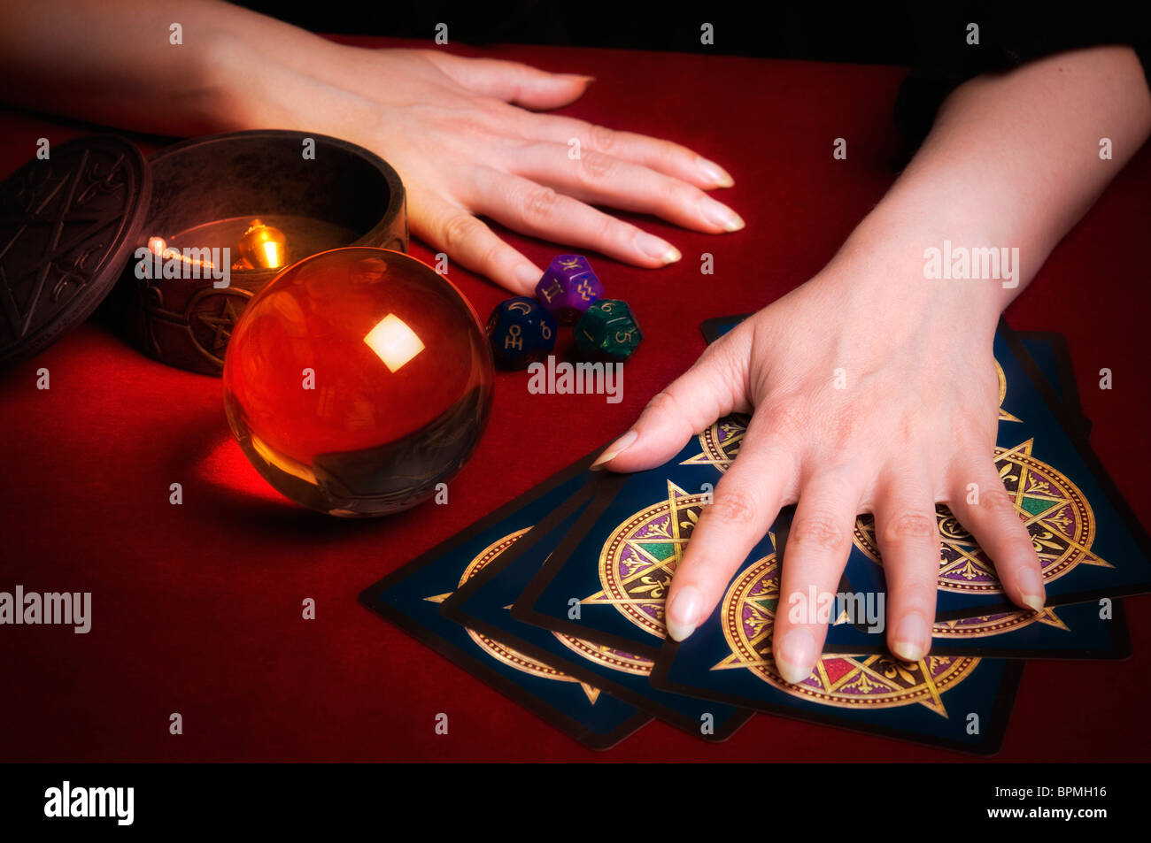 fortune teller hands doing a tarot cards reading Stock Photo Alamy
