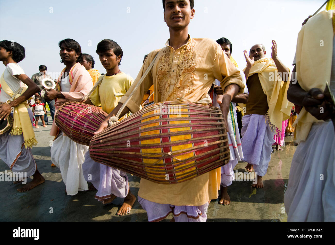 A colorful musical precession during a holy Hindu festival. Stock Photo