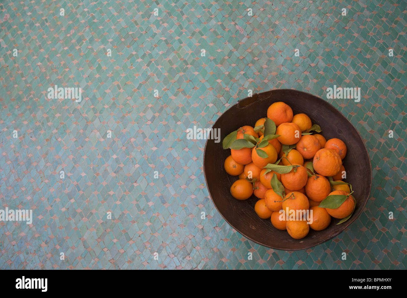 A bowl of oranges in a villa in the Palmeraie, Marrakech, Morocco, North Africa Stock Photo