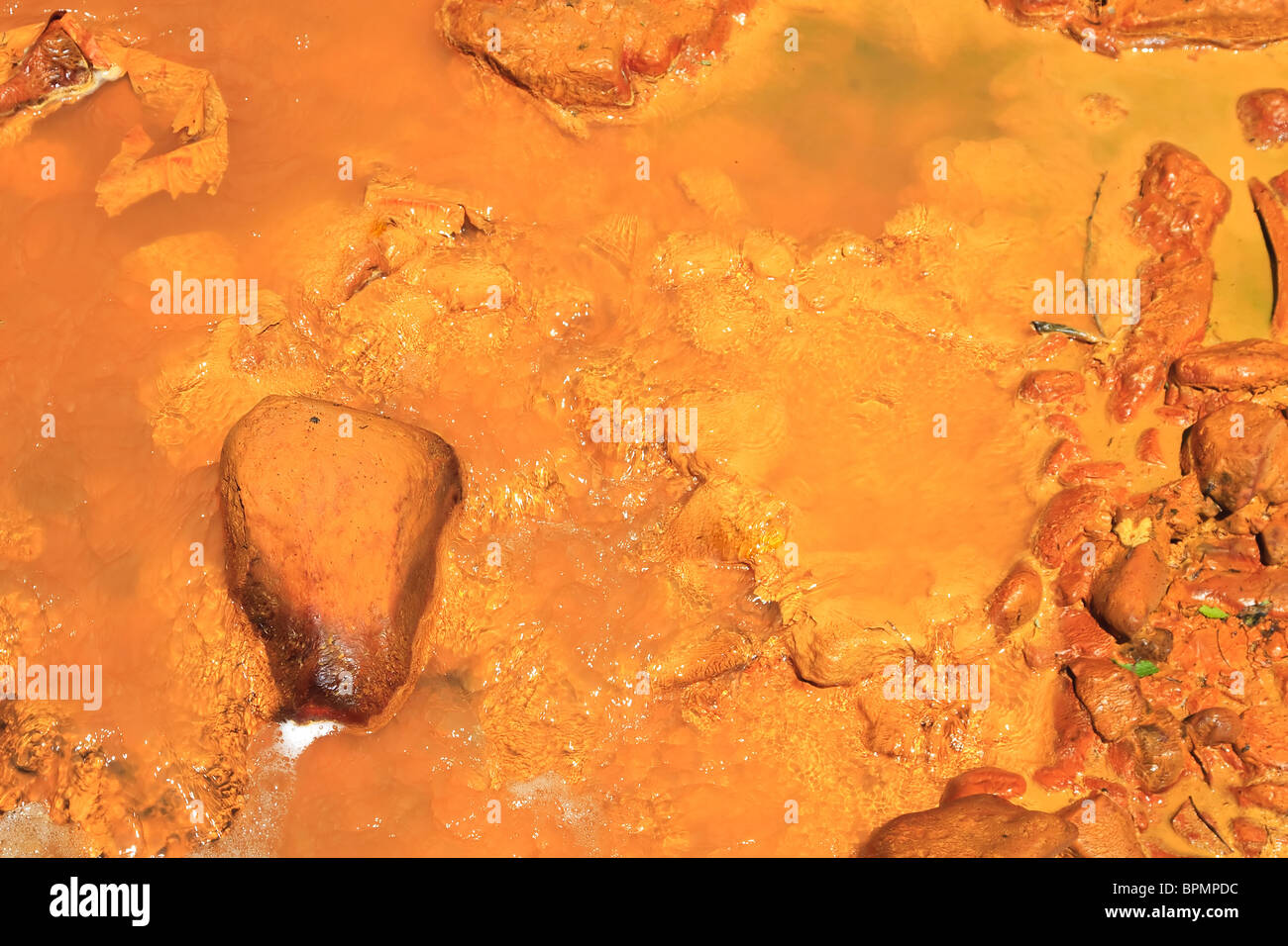 Polluted river by mining in Apuseni Mountains, Romania. Stock Photo